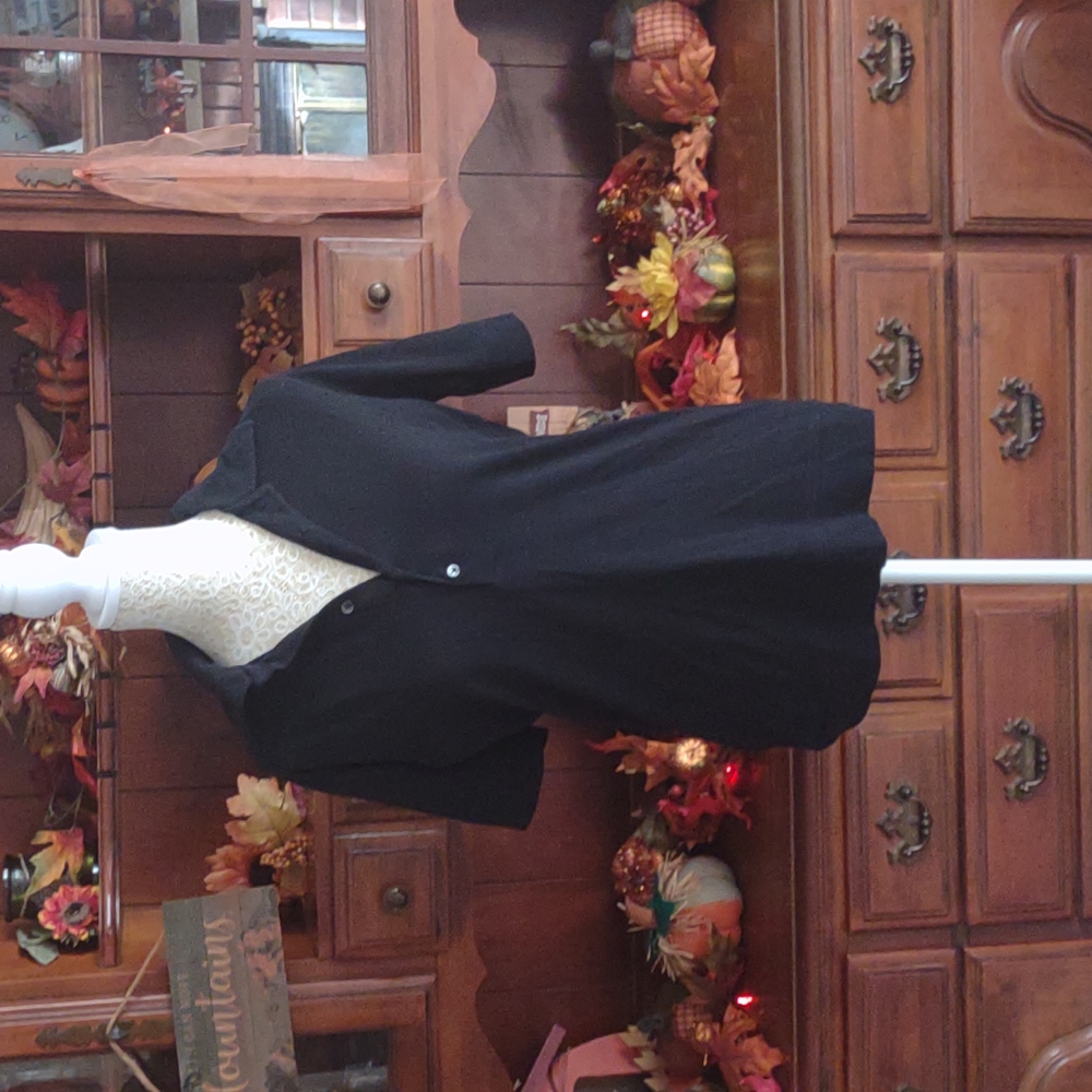 Woman's Calvin Klein black golf shirt. Size large.